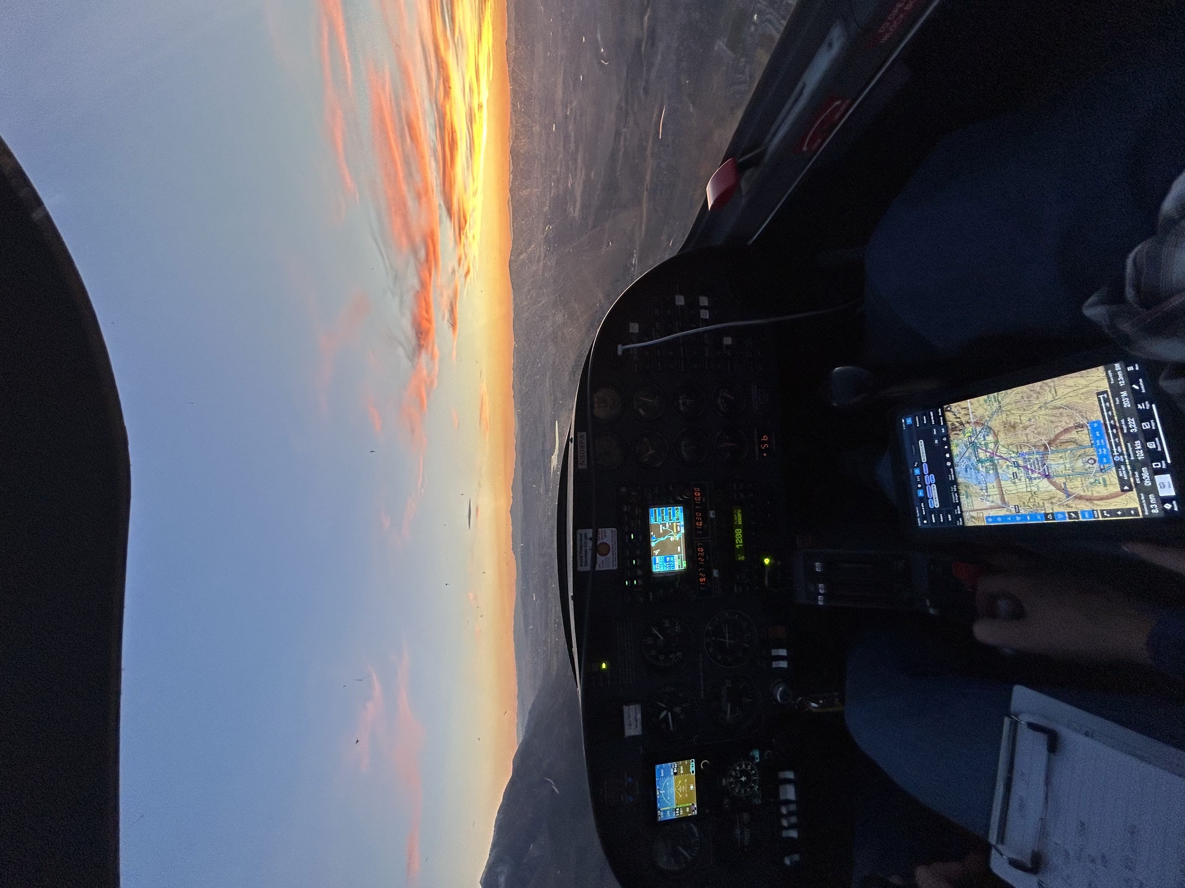 Aerial view over the Mountain West at sunset from the cockpit
