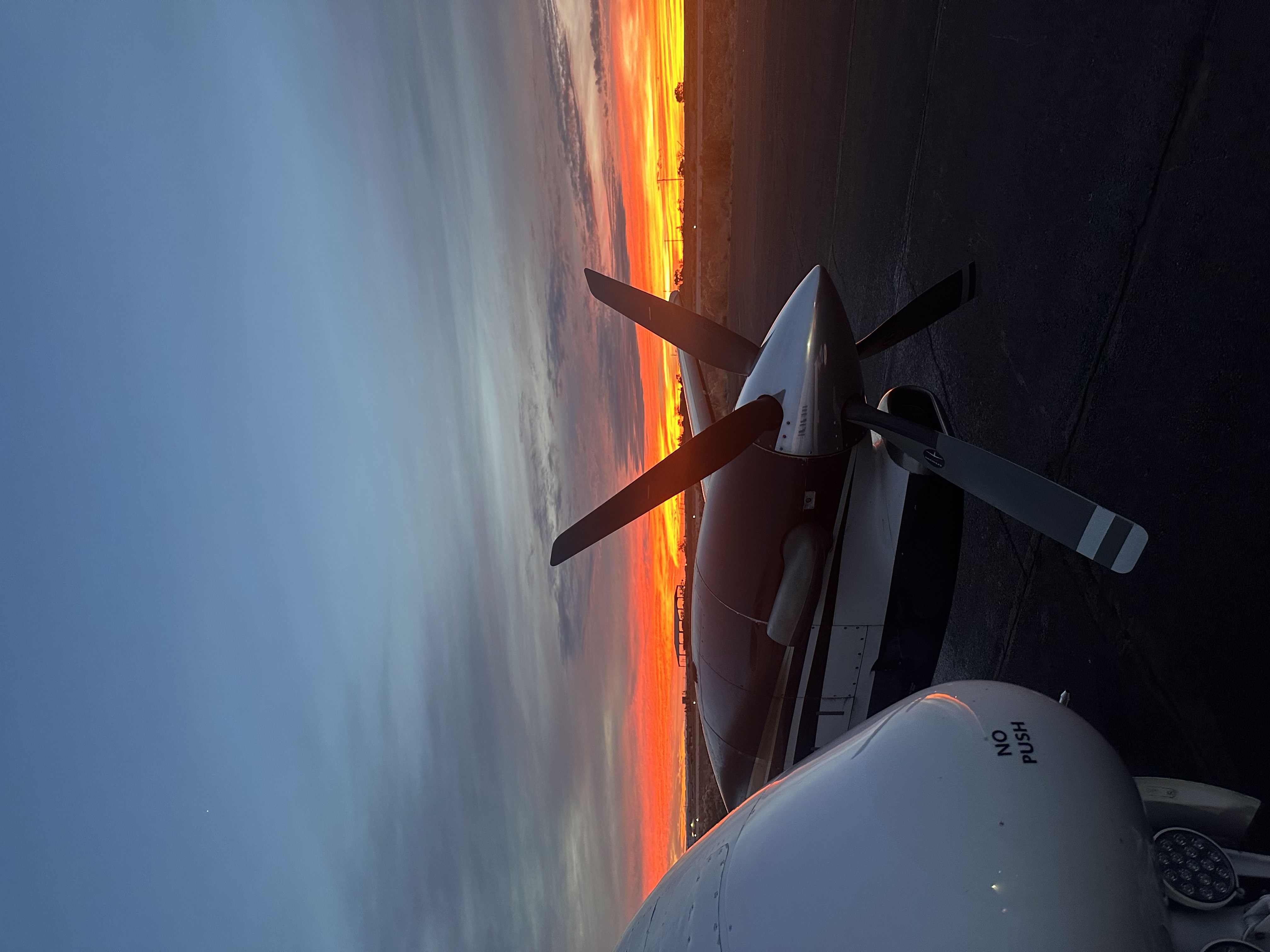 Aircraft propeller on the ramp at sunrise
