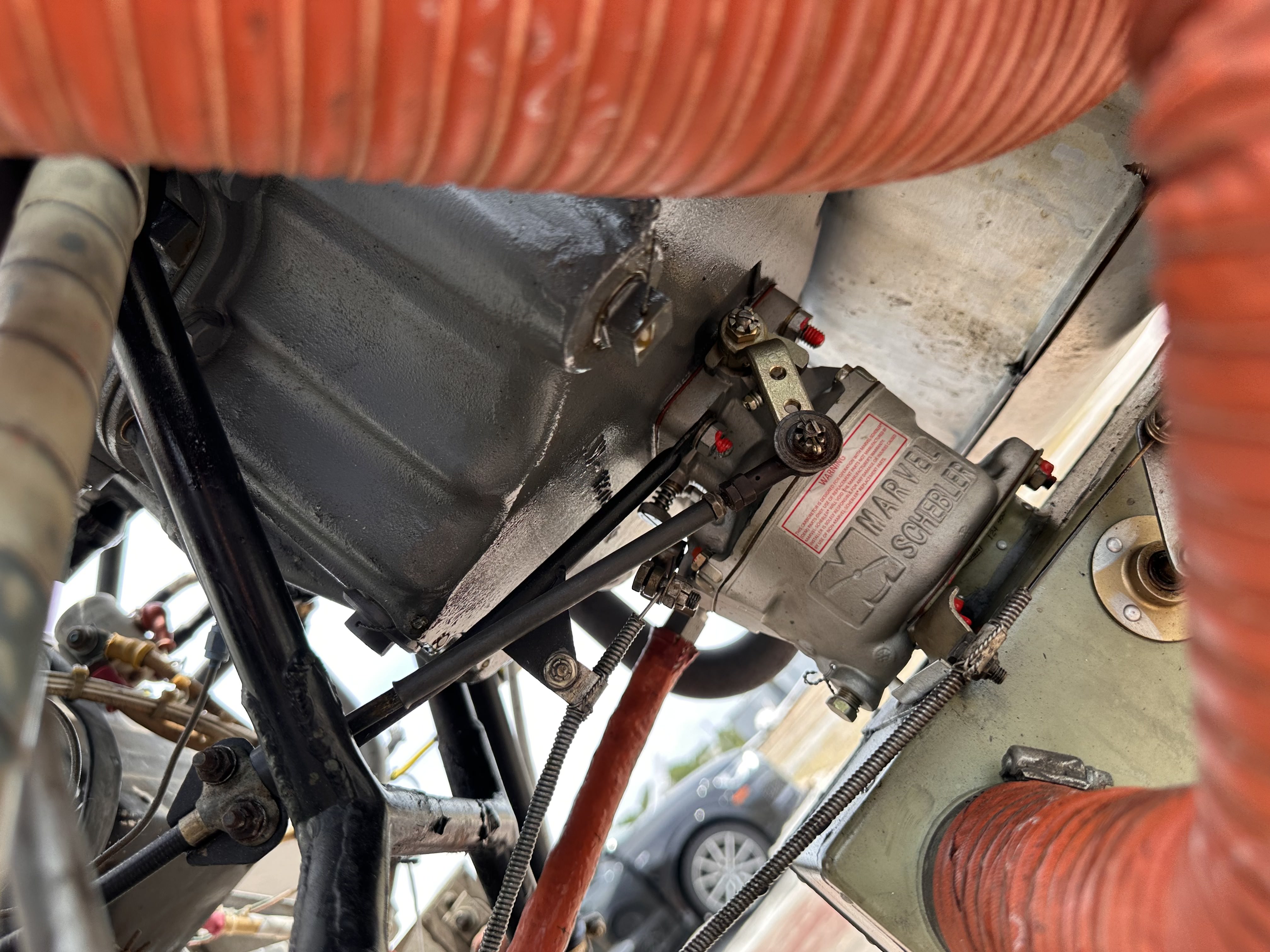 Carburetor and engine mount detail during maintenance